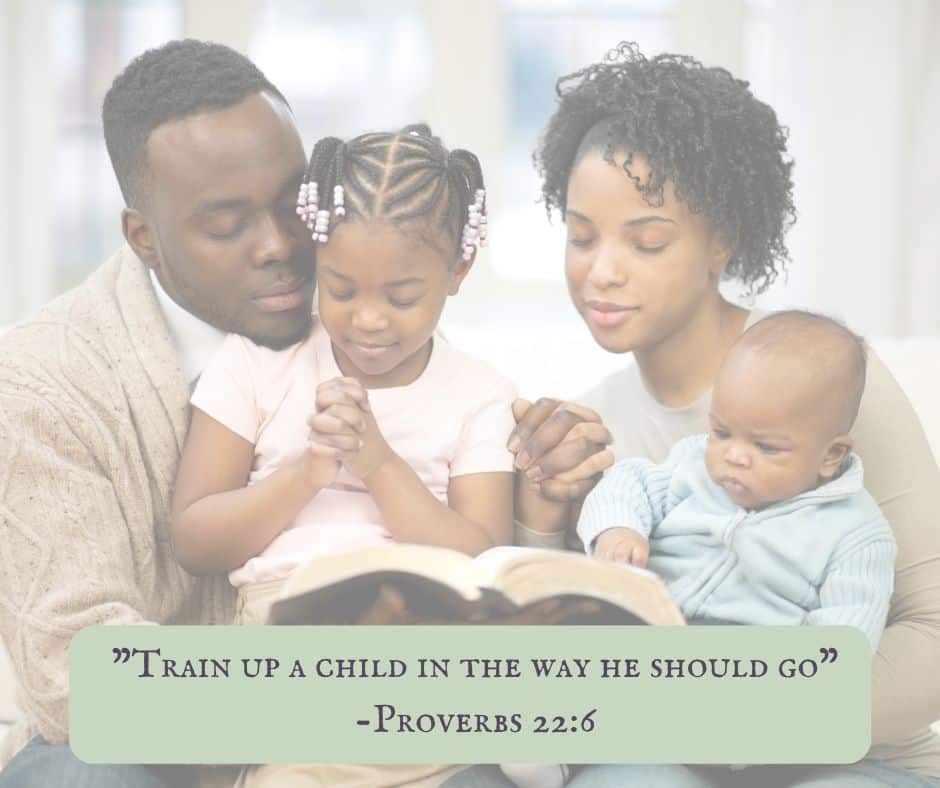 Parents praying with children