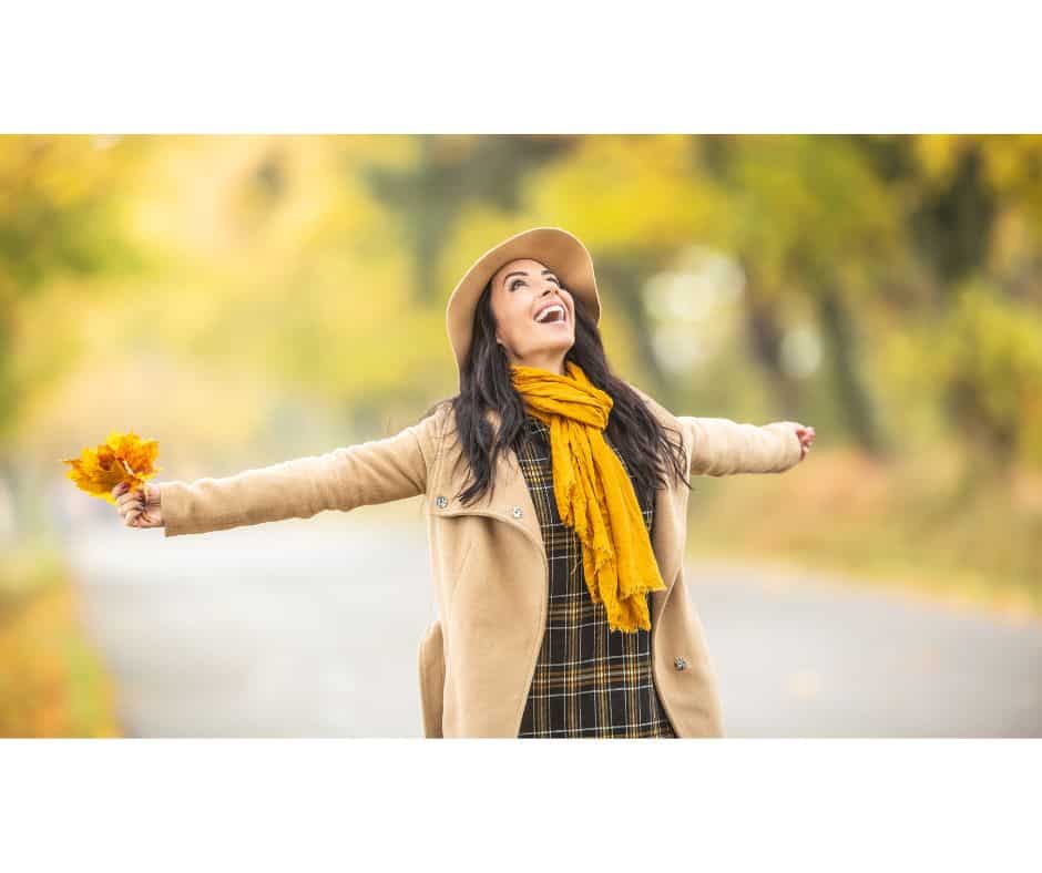 woman looking up happy, celebrating
