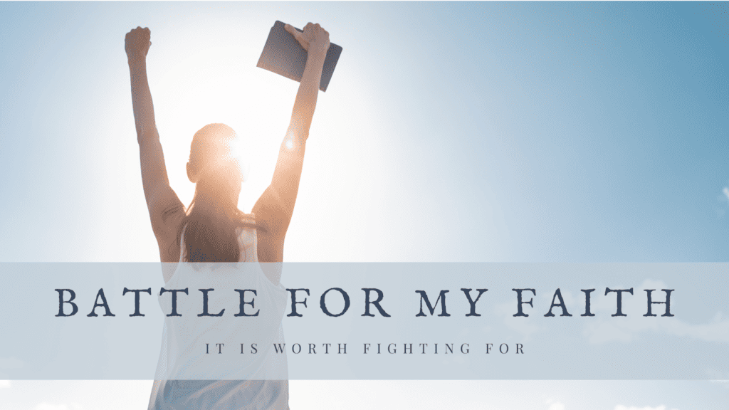 Woman worshipping with hands in the air holding a Bible