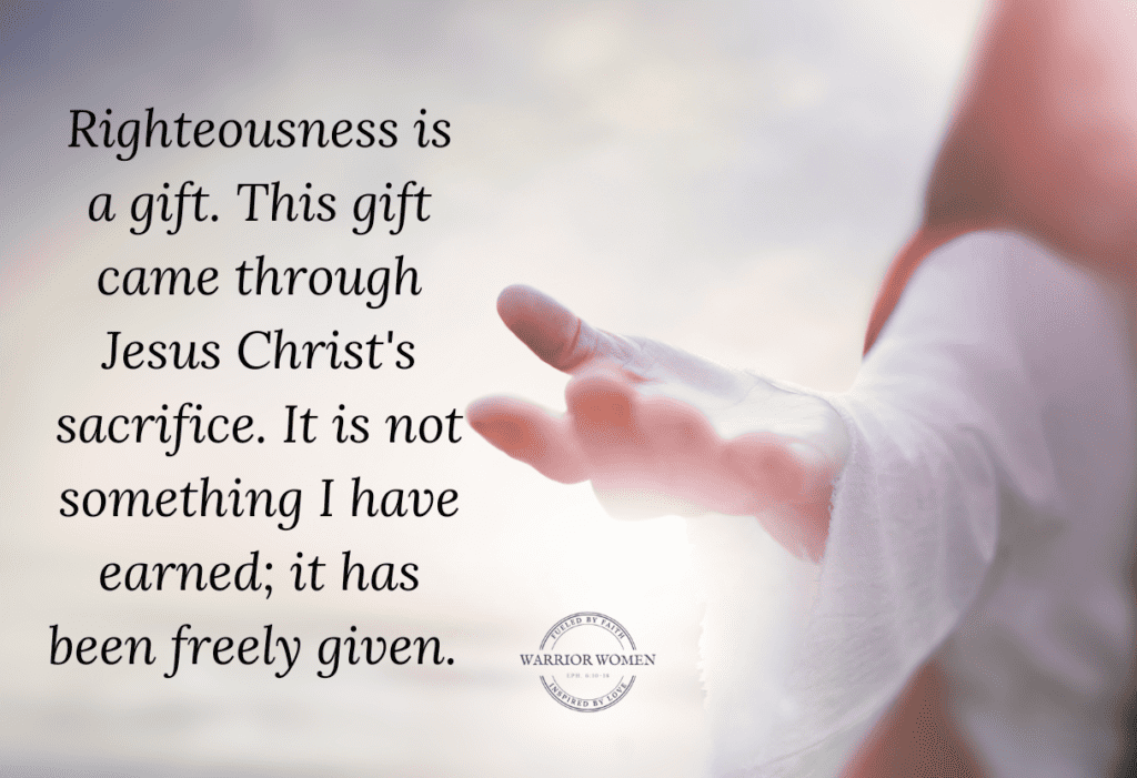 Blurred image of Jesus holding out His hand, "righteousness is a gift"