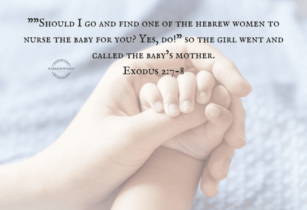 mother's hand holding baby's hand