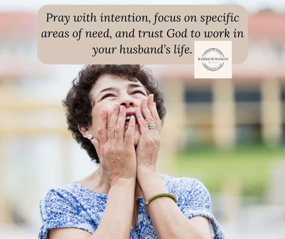 middle aged woman with hands partially covering face, standing outside looking up as in earnest prayer